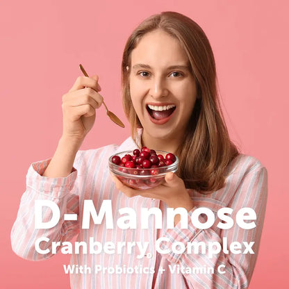 Woman enjoying fresh cranberries, D-mannose cranberry complex with probiotics and vitamin C